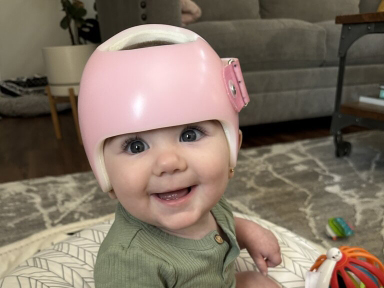 baby wearing helmet