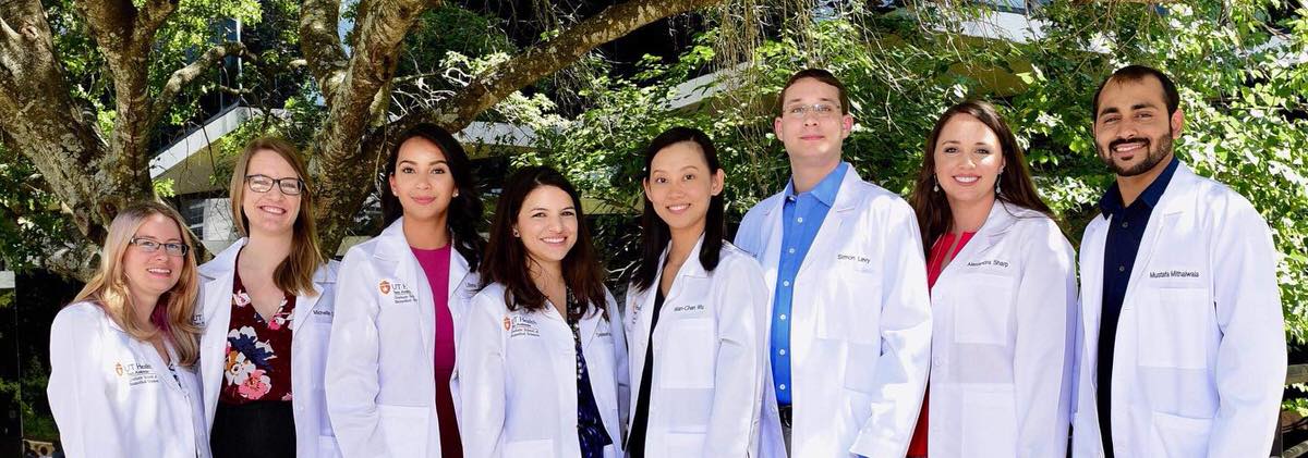 Group of neuroscience students in white coats