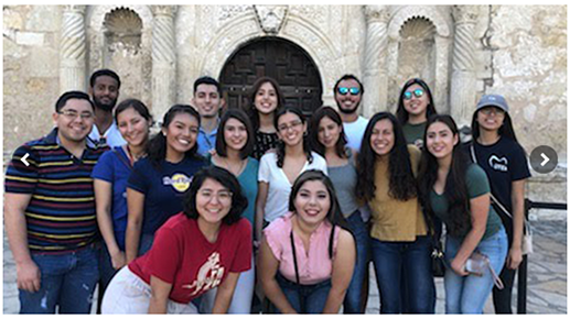 dental students posing in front of alamo