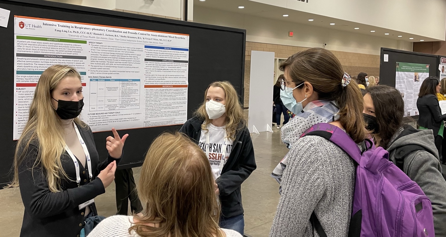 Students present a poster at the Texas Speech-Hearing Association conference 