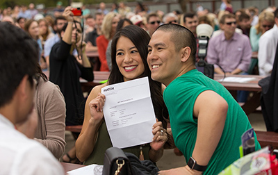 female medical student showing her match letter