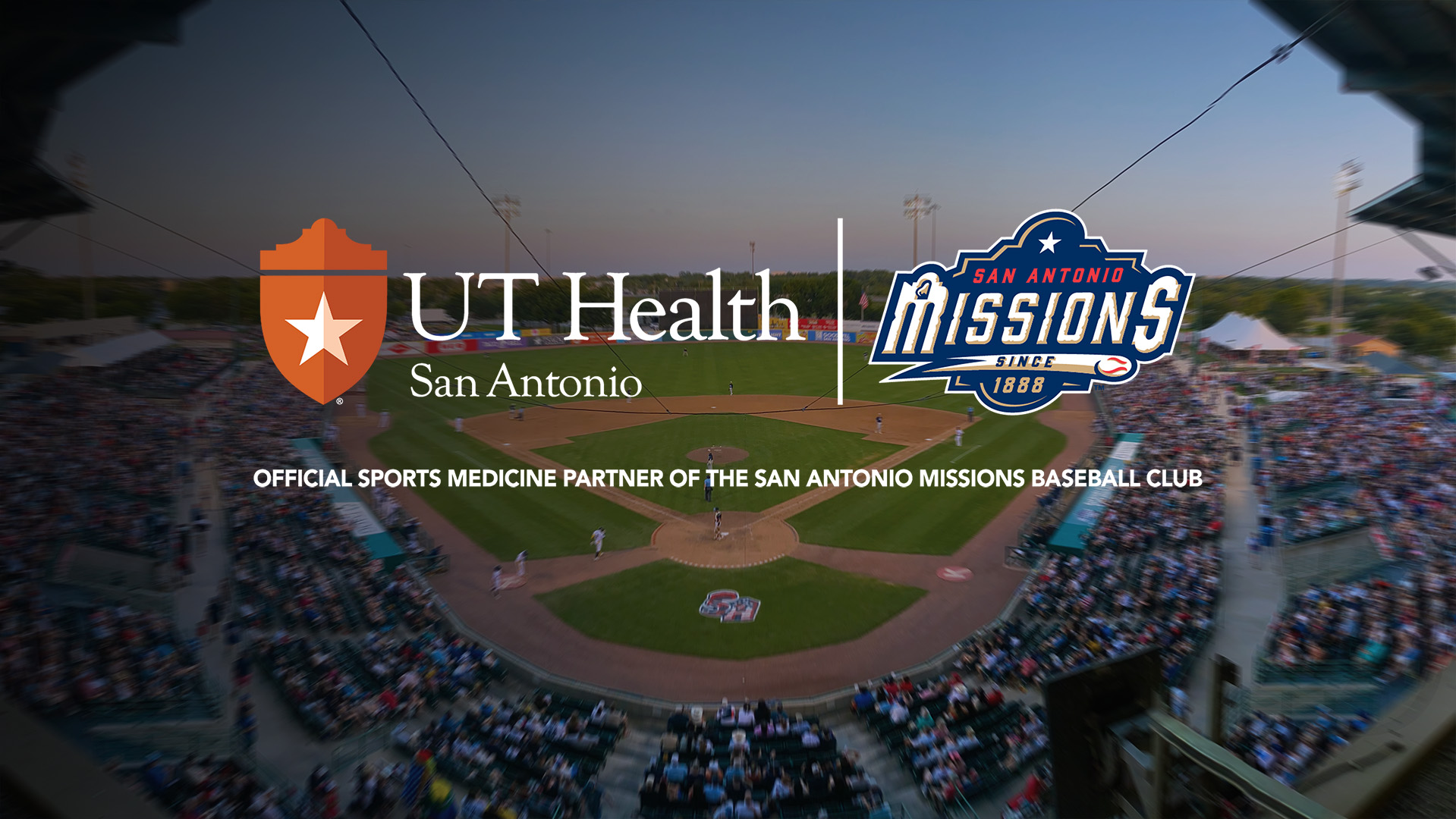 baseball field with ut health and san antonio missions graphic overlaid