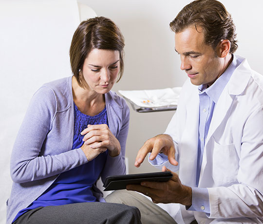 Female patient with doctor