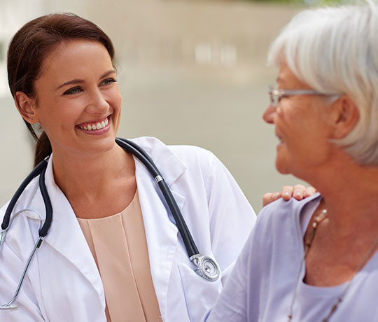 Female doctor with patient