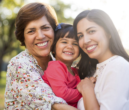 Child with mother and grandmother