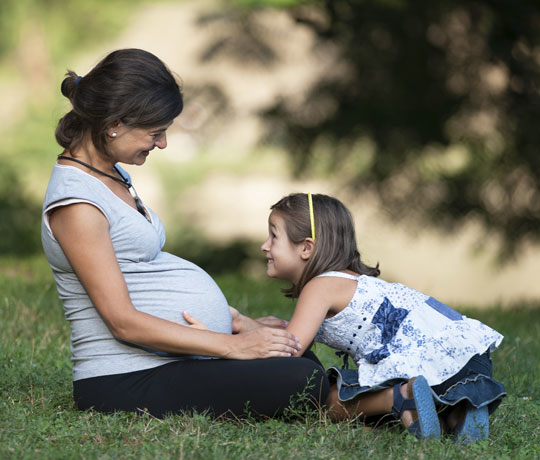 pregnant mom and daughter