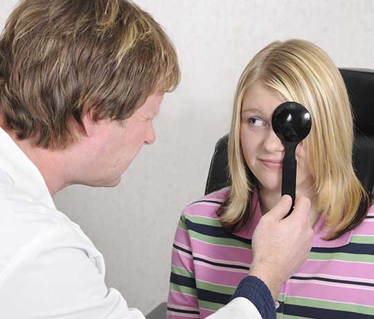 Child with optometrist