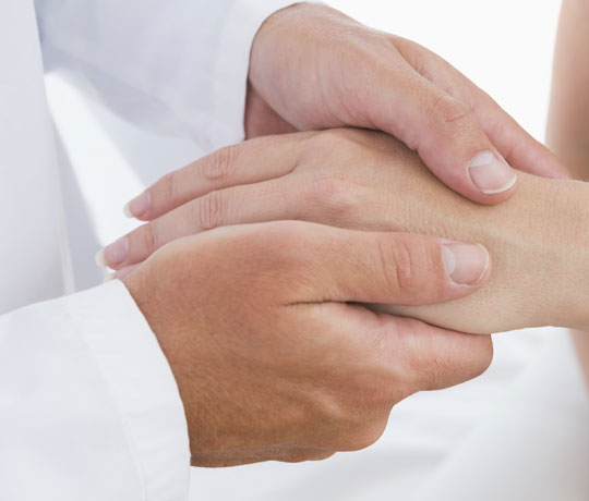 Patient and doctor's hands