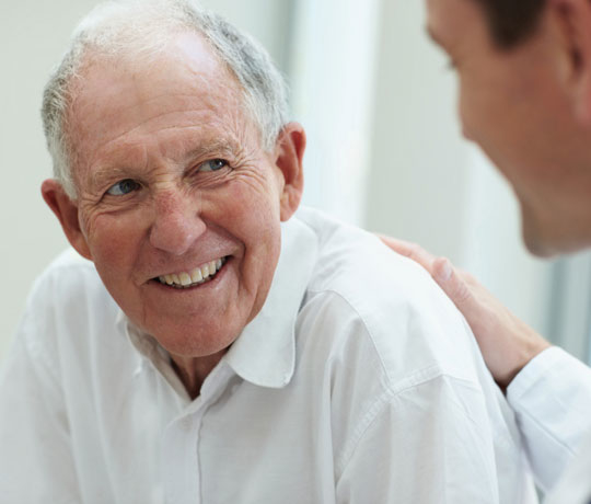 Elderly patient with doctor