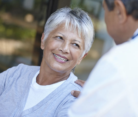 Urinary incontinence patient with doctor