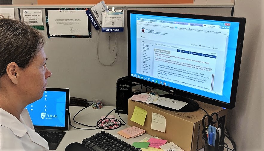 Dr. Gruslova at her computer