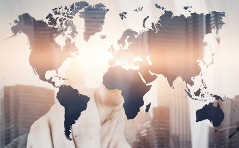 double exposure of a researcher pointing at the world