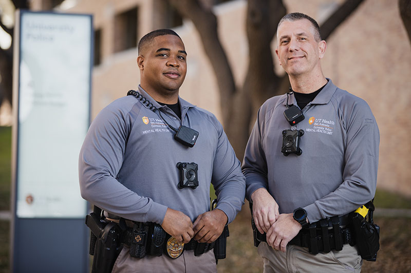 Two officers reviewing paper work together