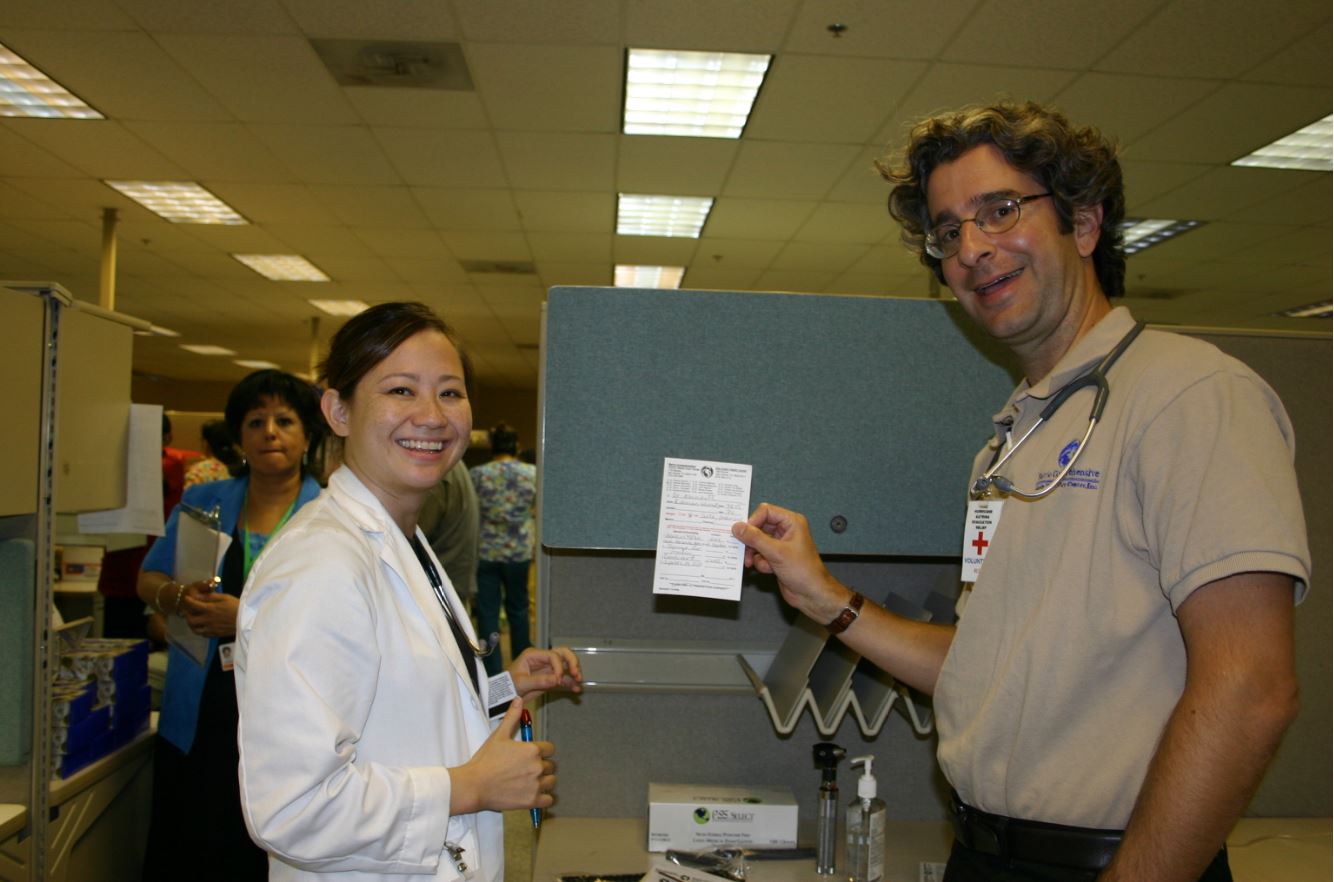  A nursing student helps fill a prescription for a patient hospitalized as a result of Hurricane Katrina.