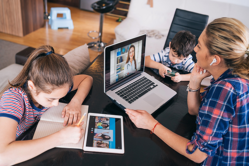 Mother speaking to doctor over video conference