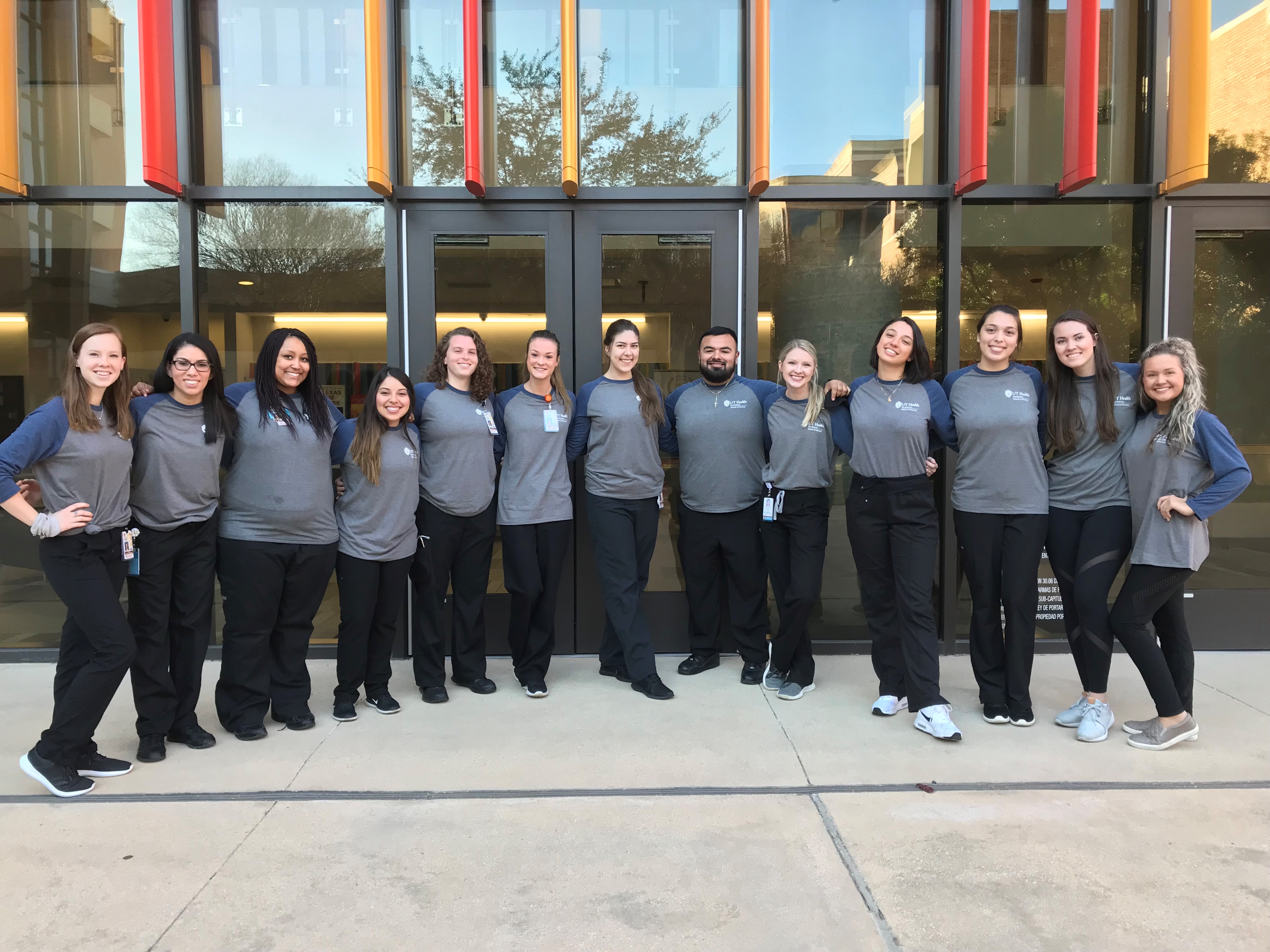 peer mentors in front of the ALTC building
