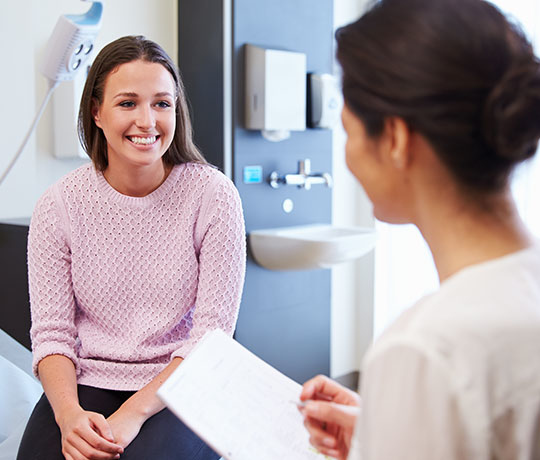 Woman with physician