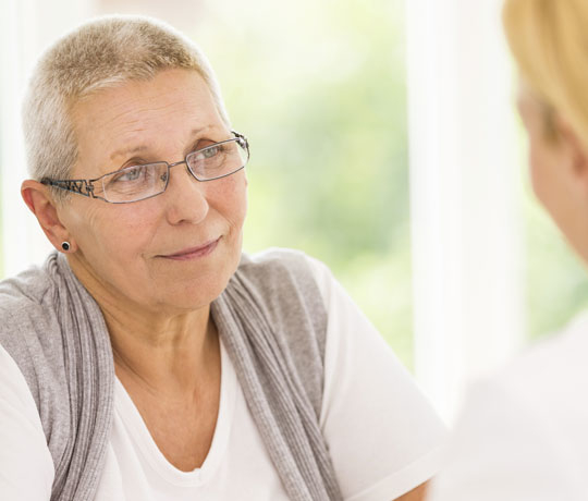 Women speaking with physician