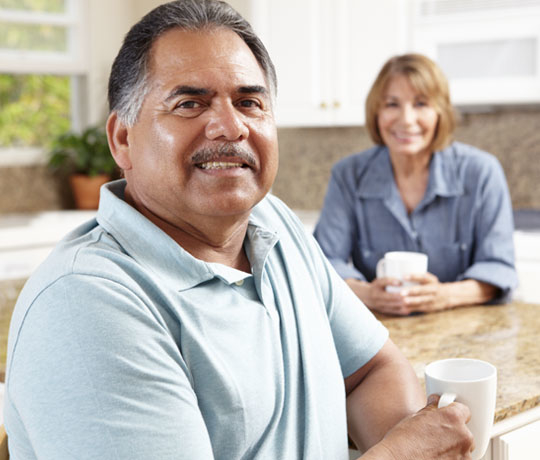 Husband having tea with wife