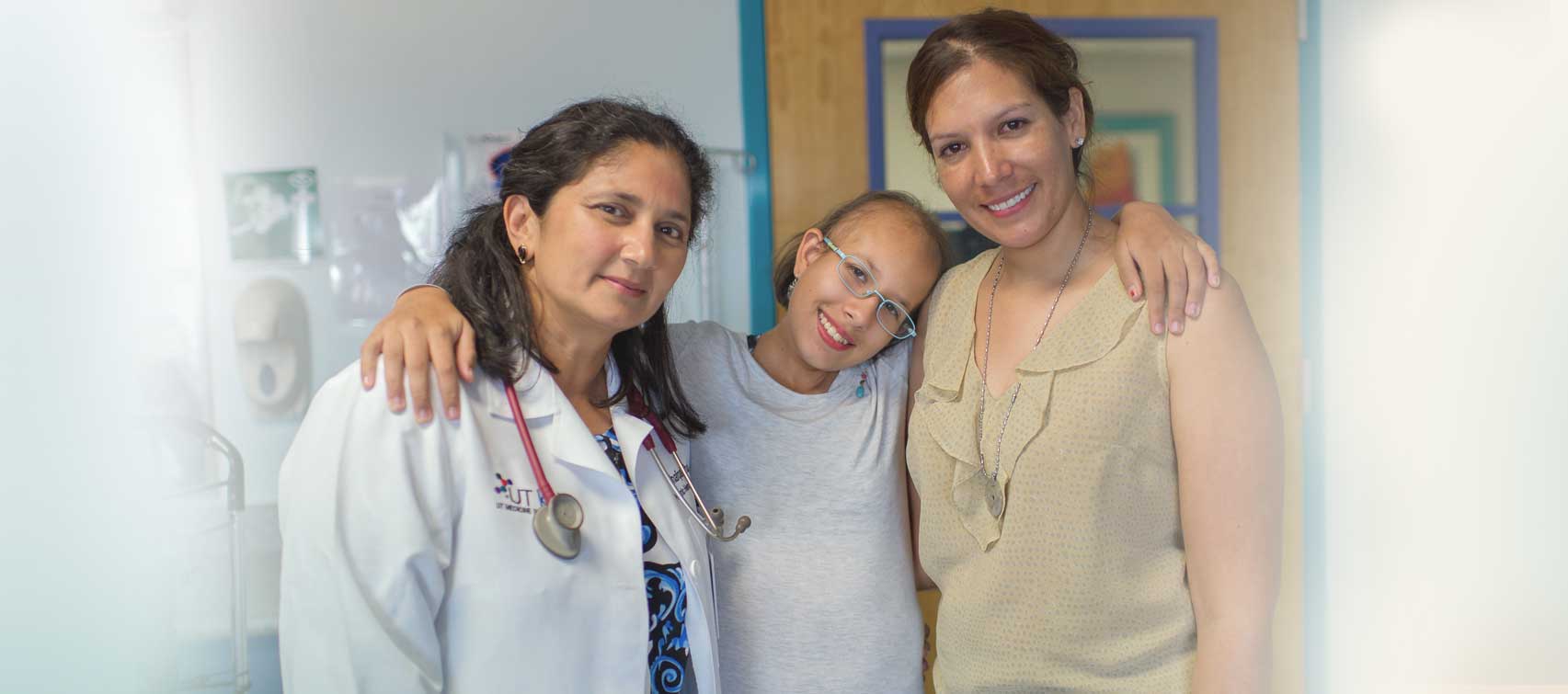 Pediatric hematologist-oncologist Shafqat Shah, M.D., Samantha Alvarez and Duke Alvarez fought together to save Samantha from an aggressive brain tumor. 