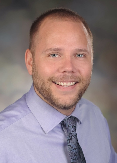 Dr. John C Moring