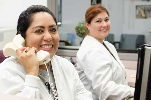 Receptionist making appointment