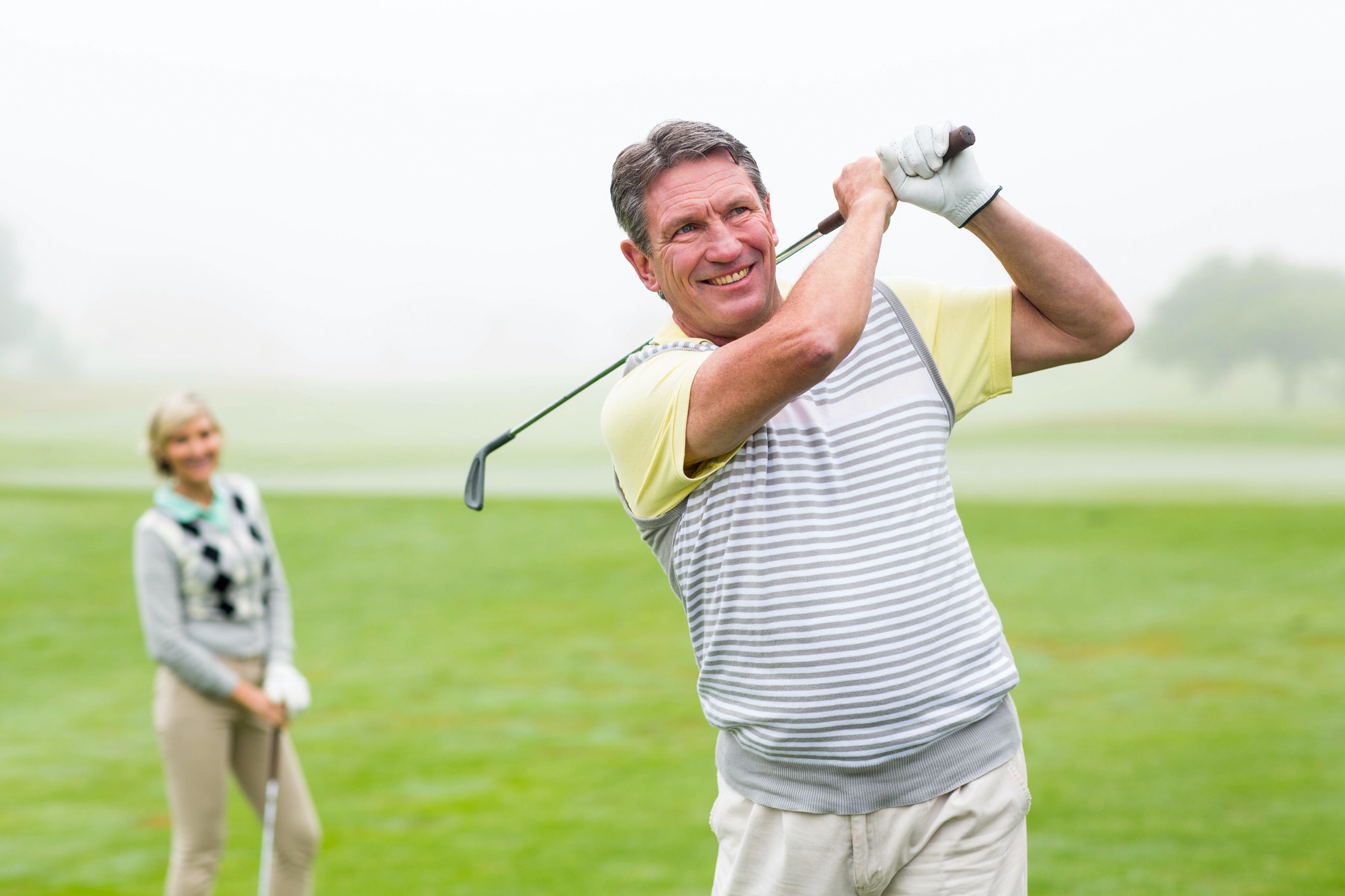 man playing golf