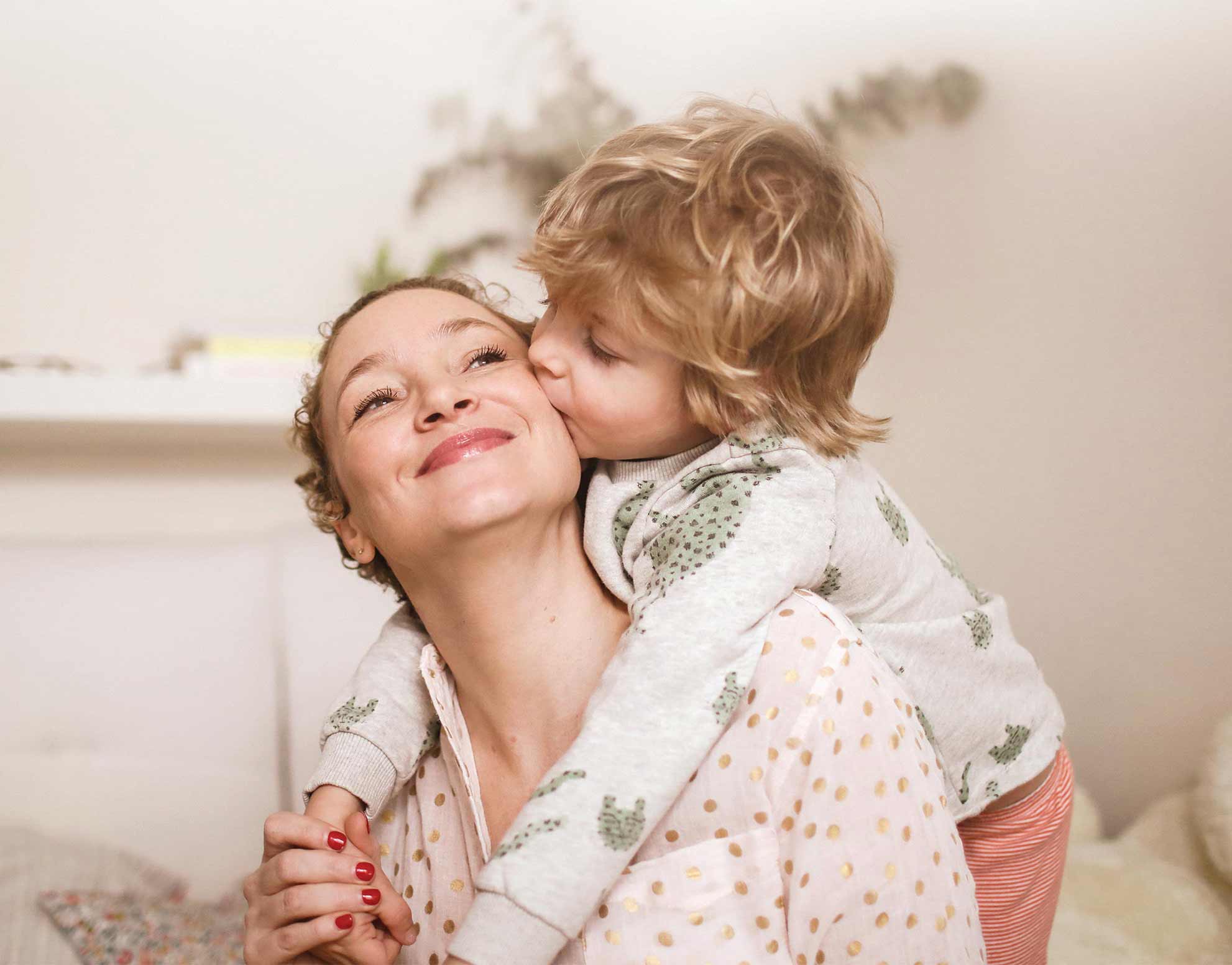 Woman and child hugging