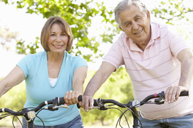 senior couple riding bikes