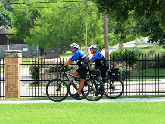 Campus police patrol officers on bicycles at UT Health San Antonio