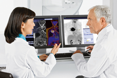Radiologists looking a x-ray scans