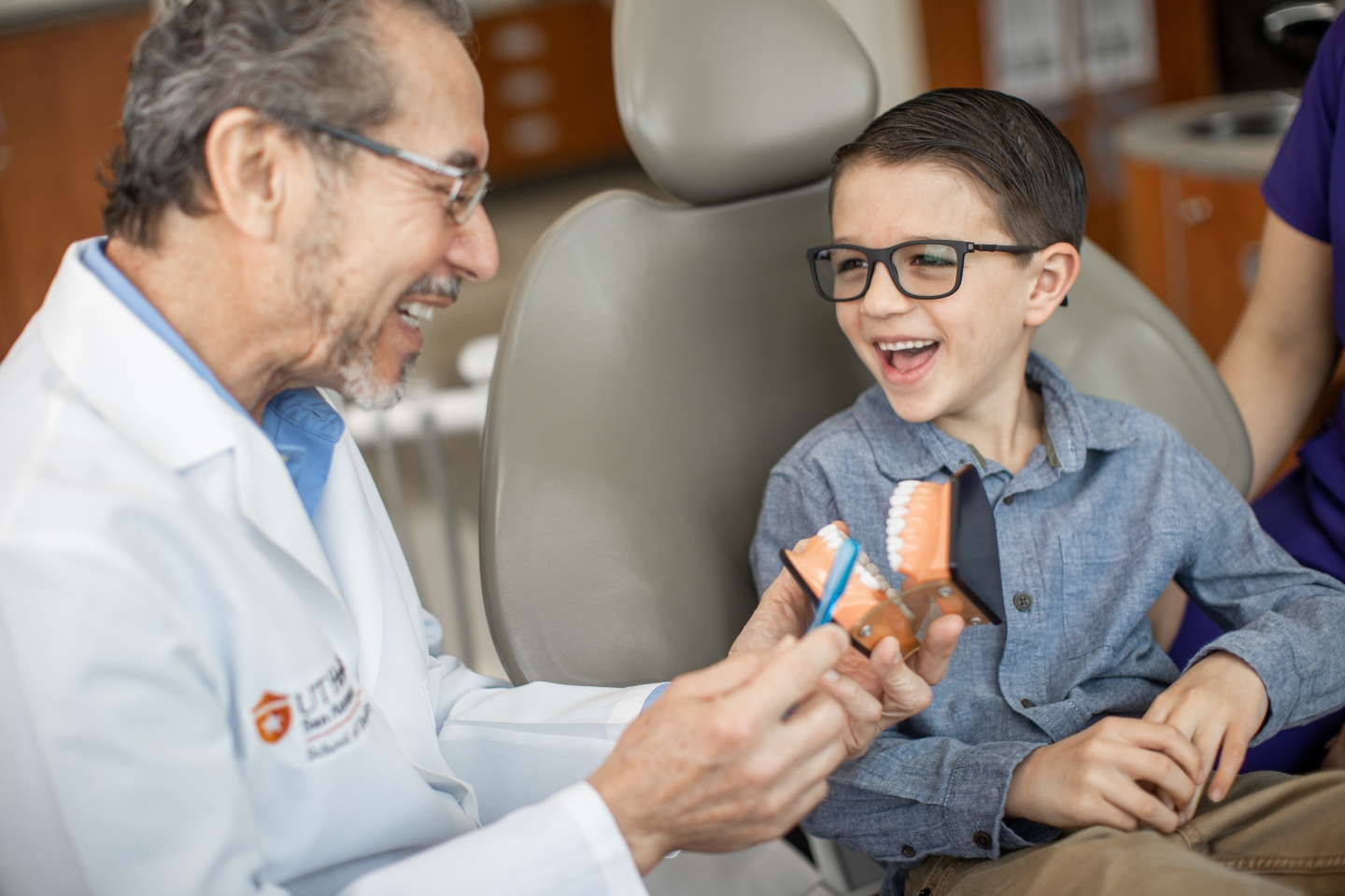 Dentist with pediatric patient