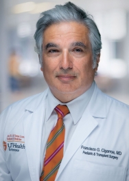 photo of Dr. Francisco Cigarroa in white coat orange stripped tie 