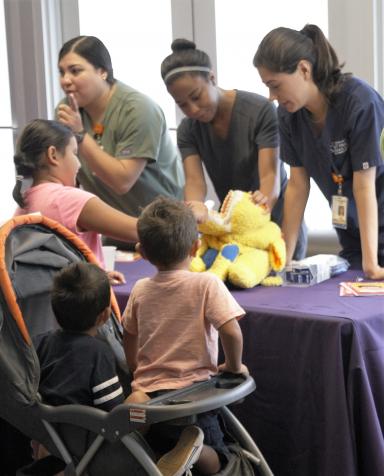 Dental students teach children oral hygiene care at Haven for Hope.