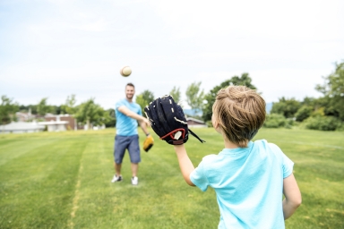 boy playing catch