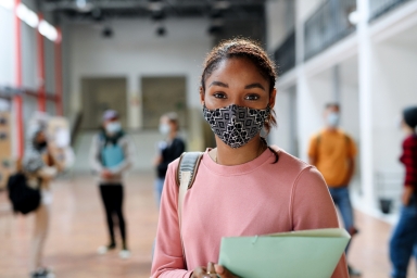 School girl wearing mask