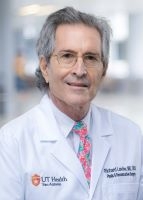 Headshot of Dr. Richard Levine in a physicians white coat