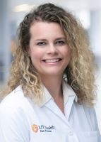 Headshot of Dr. Cassandra Williams in a physicians white coat