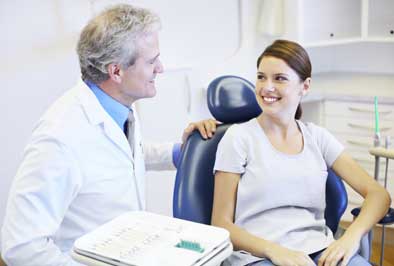 Dentist discussing nutrition tips with a patient