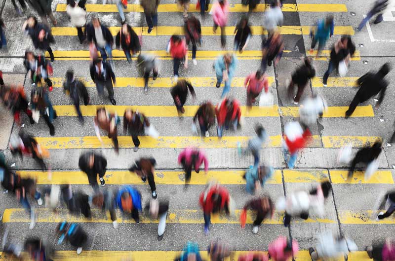 people crossing a street